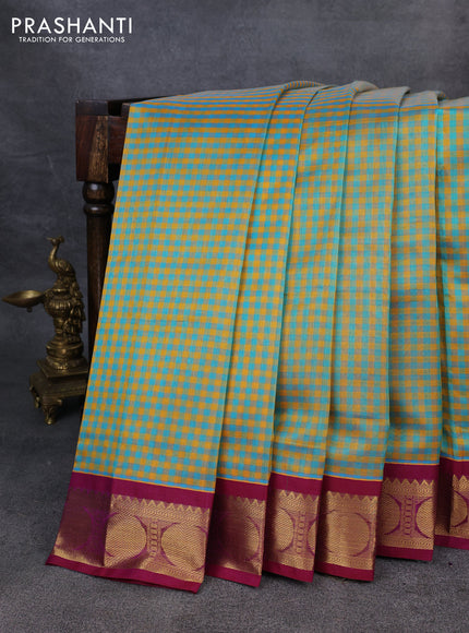Silk Cotton saree teal green and purple with allover paalum pazhamum checks and zari woven korvai border