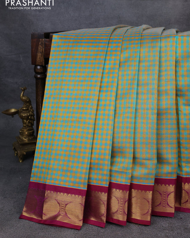 Silk Cotton saree teal green and purple with allover paalum pazhamum checks and zari woven korvai border