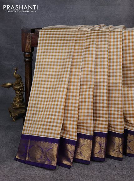 Silk Cotton saree sandal and blue with allover paalum pazhamum checks and zari woven korvai border