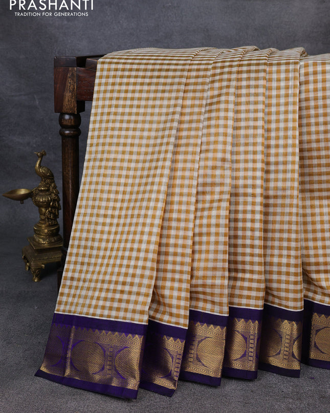 Silk Cotton saree sandal and blue with allover paalum pazhamum checks and zari woven korvai border
