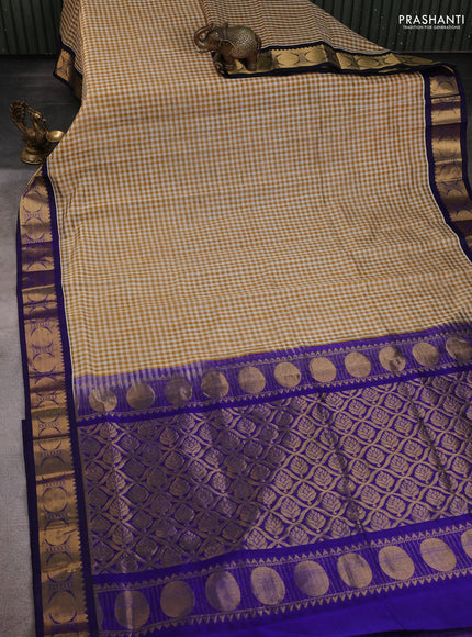 Silk Cotton saree sandal and blue with allover paalum pazhamum checks and zari woven korvai border