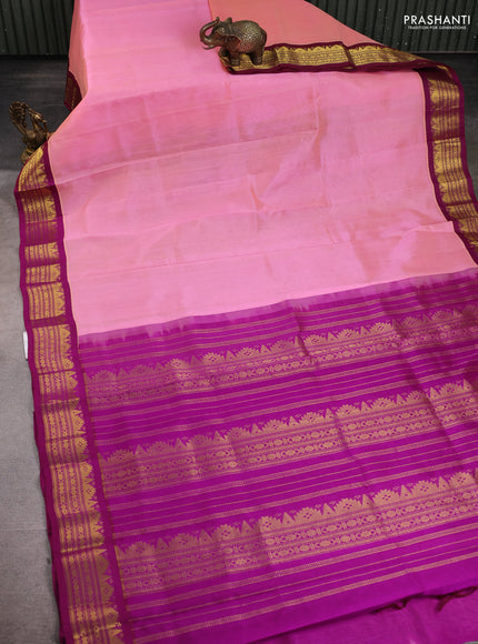 Silk Cotton saree peach pink and purple with plain body and zari woven korvai border