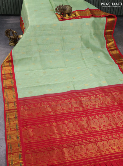 Silk Cotton saree pista green and red with allover zari checks & buttas and annam zari woven korvai border
