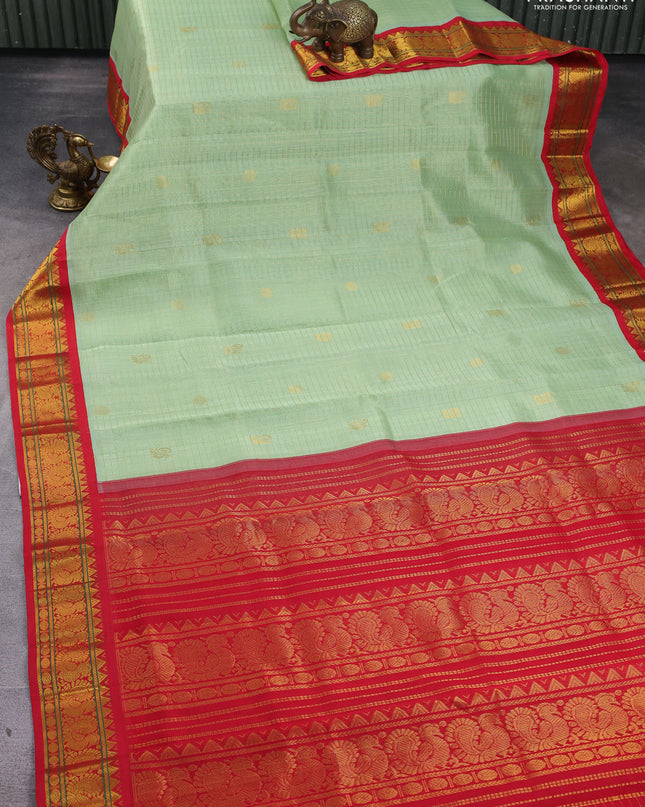 Silk Cotton saree pista green and red with allover zari checks & buttas and annam zari woven korvai border