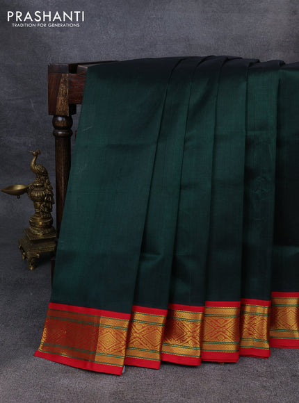 Silk Cotton saree dark green and red with plain body and zari woven korvai border