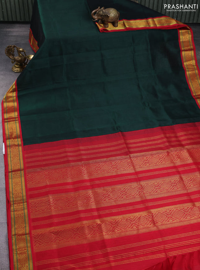 Silk Cotton saree dark green and red with plain body and zari woven korvai border