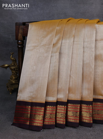 Silk Cotton saree sandal and deep purple with plain body and zari woven korvai border