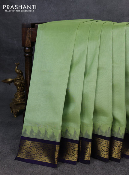 Silk Cotton saree pista green and blue with zari woven buttas and zari woven korvai border