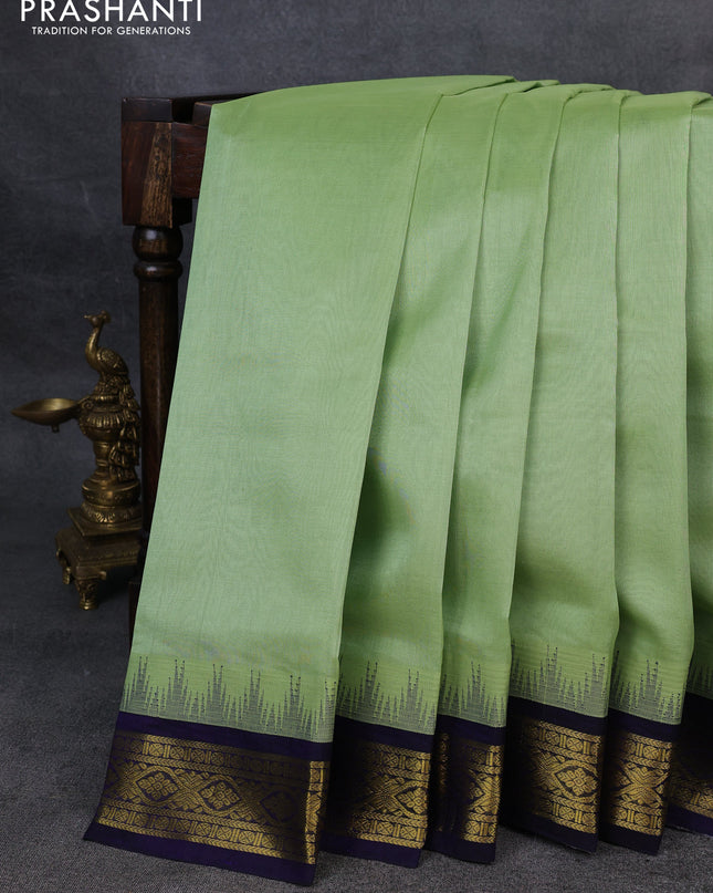 Silk Cotton saree pista green and blue with zari woven buttas and zari woven korvai border