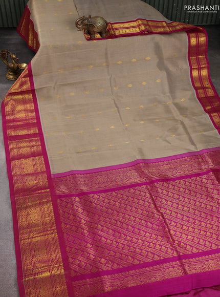Silk Cotton saree beige and magenta pink with zari woven buttas and zari woven border