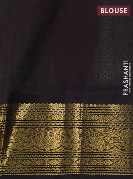 Silk Cotton saree pastel green and black with zari woven buttas and zari woven border