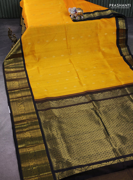 Silk Cotton saree mango yellow and black with zari woven buttas and zari woven border