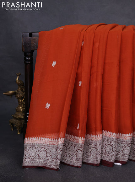 Pure banarasi chiffon silk saree orange and deep maroon with silver zari woven buttas and silver zari woven border