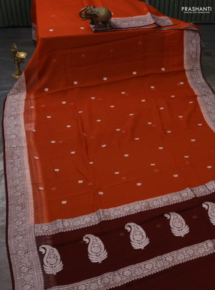 Pure banarasi chiffon silk saree orange and deep maroon with silver zari woven buttas and silver zari woven border