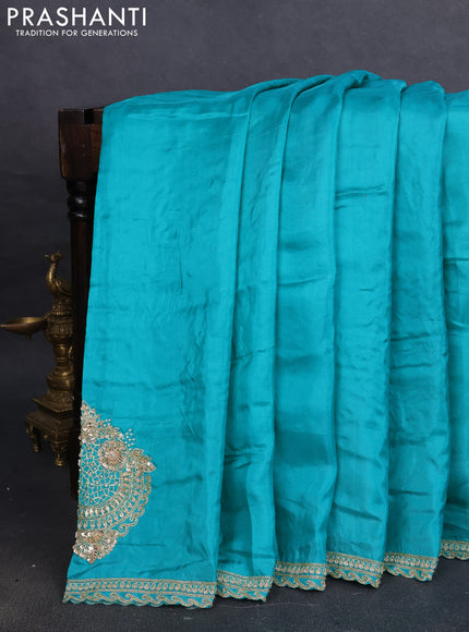 Banarasi silk saree teal blue with plain body and embroidery pallu