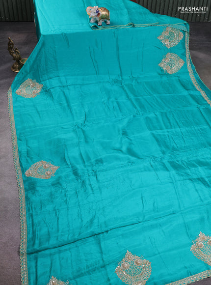 Banarasi silk saree teal blue with plain body and embroidery pallu