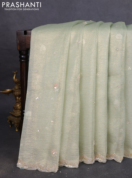 Crush tissue saree pista green with beaded work
