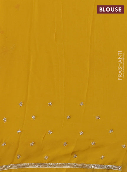 Georgette saree mustard yellow with allover embroidery work