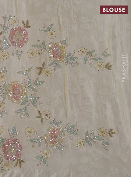 Tissue saree cream with plain body and embroidery border