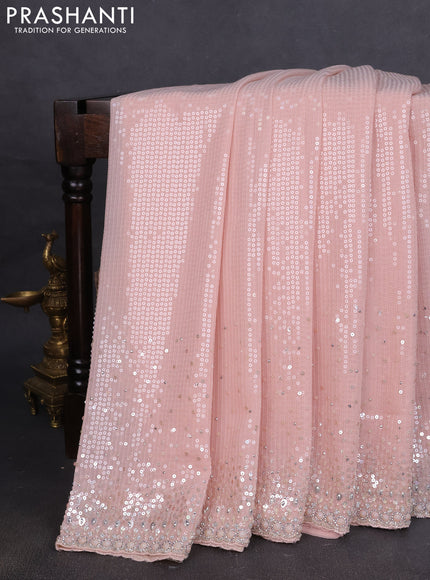 Georgette saree mild peach with allover sequin work