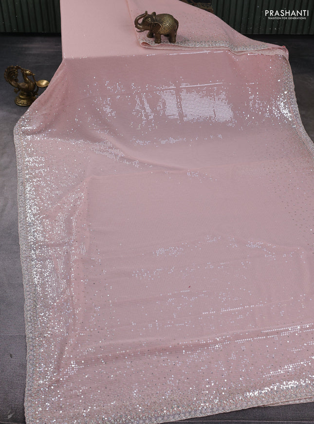 Georgette saree mild peach with allover sequin work