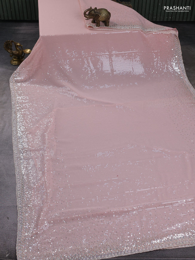 Georgette saree mild peach with allover sequin work