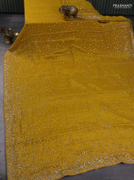 Crepe saree mustard yellow with allover sequin work