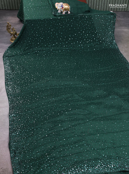 Crepe saree bottle green with allover sequin work