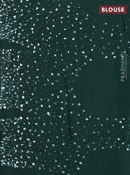 Crepe saree bottle green with allover sequin work