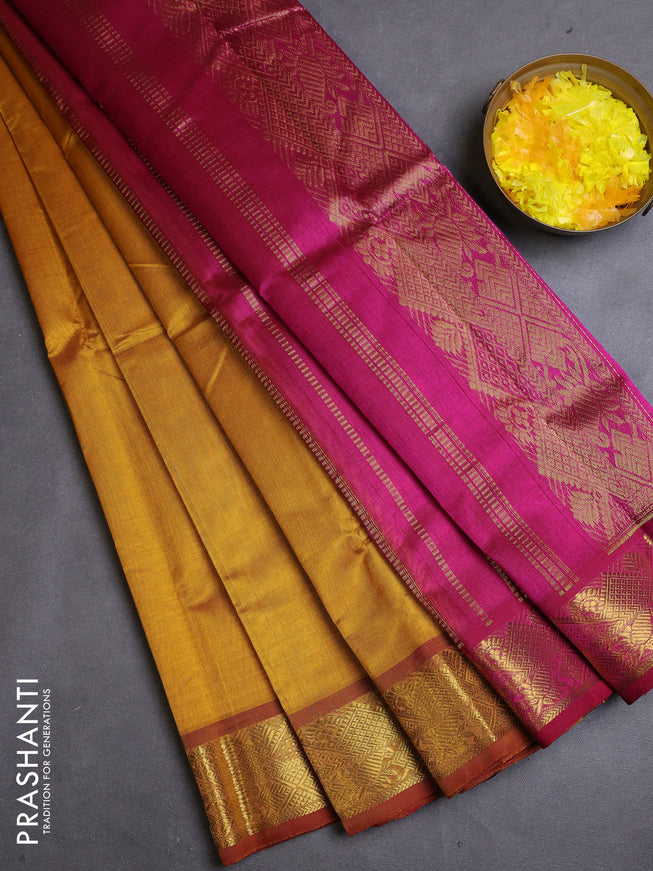 Silk cotton saree mustard yellow and magenta pink with plain body and zari woven border