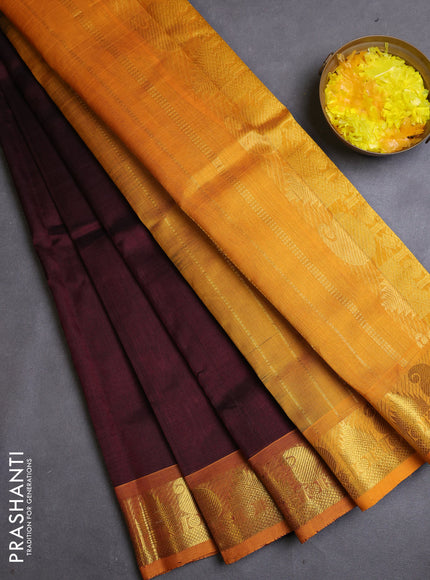 Silk cotton saree deep maroon and mustard yellow with plain body and zari woven border