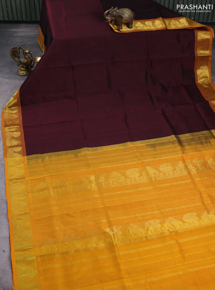 Silk cotton saree deep maroon and mustard yellow with plain body and zari woven border