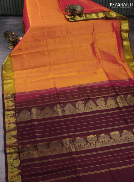 Silk cotton saree sunset orange and deep maroon with plain body and zari woven border