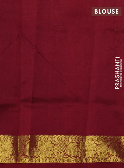 Silk cotton saree dark green and maroon with plain body and zari woven border