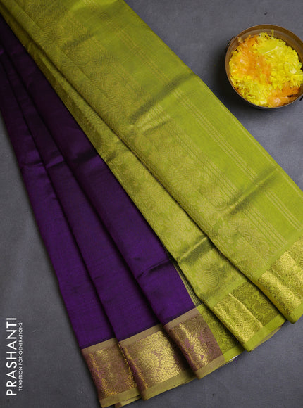 Silk cotton saree violet and light green with plain body and zari woven border