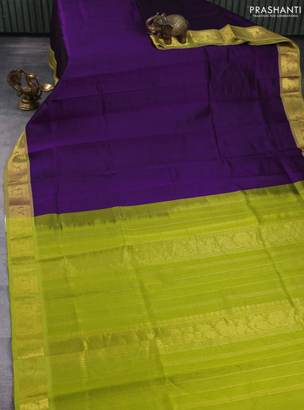 Silk cotton saree violet and light green with plain body and zari woven border