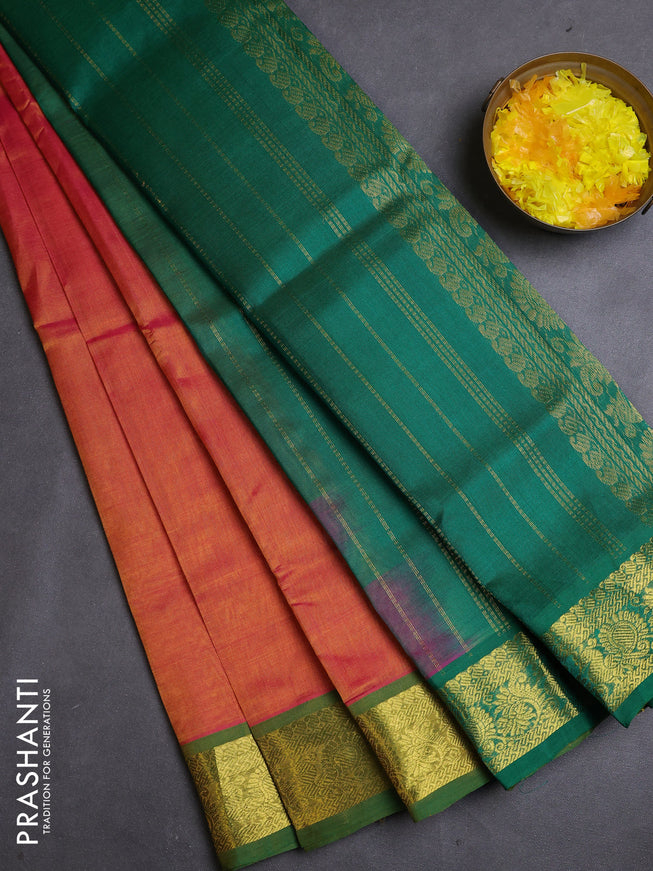 Silk cotton saree peach pink and green with plain body and zari woven border