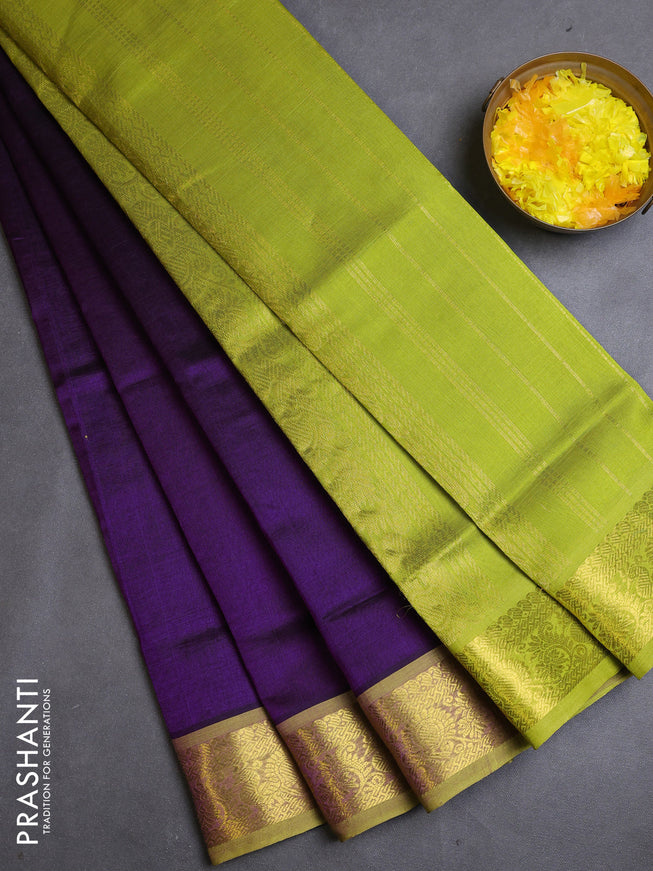 Silk cotton saree purple and light green with plain body and zari woven border