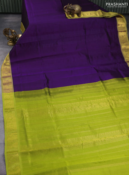 Silk cotton saree purple and light green with plain body and zari woven border