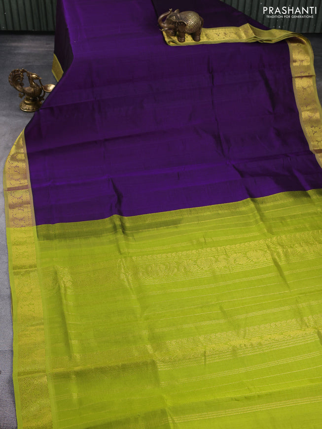 Silk cotton saree purple and light green with plain body and zari woven border