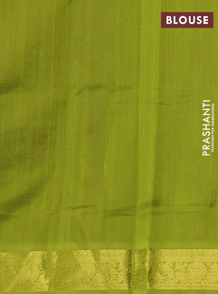 Silk cotton saree purple and light green with plain body and zari woven border
