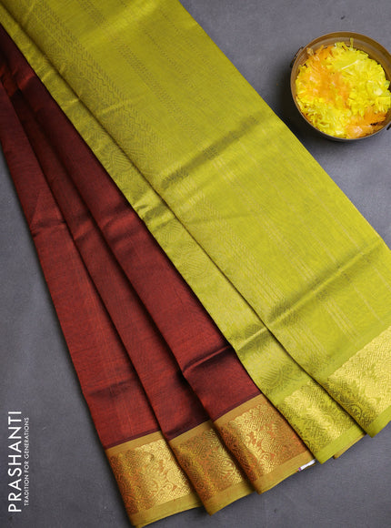 Silk cotton saree rust shade and lime green with plain body and zari woven border