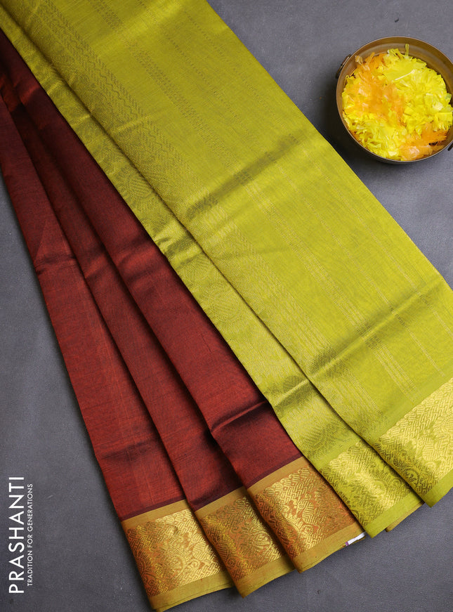 Silk cotton saree rust shade and lime green with plain body and zari woven border