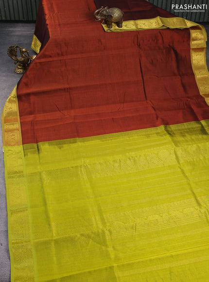 Silk cotton saree rust shade and lime green with plain body and zari woven border