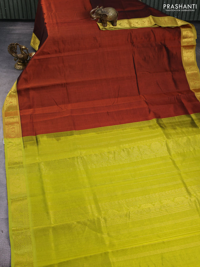 Silk cotton saree rust shade and lime green with plain body and zari woven border