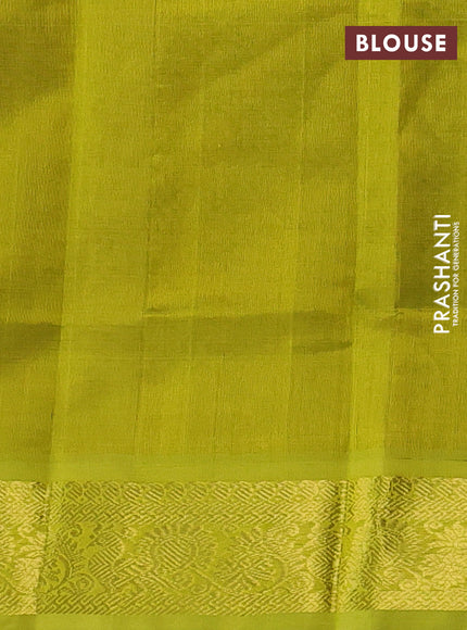 Silk cotton saree rust shade and lime green with plain body and zari woven border