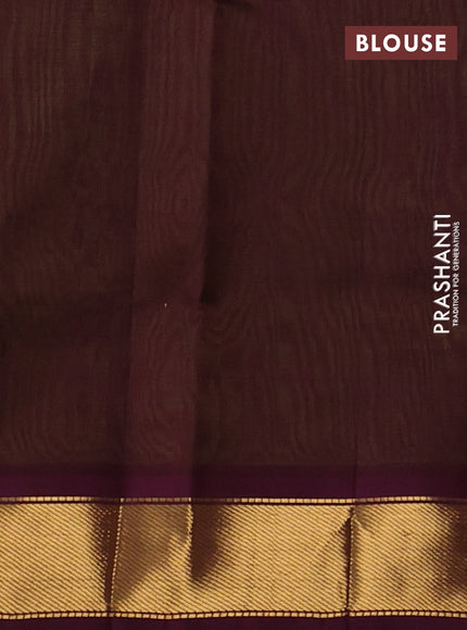 Silk cotton saree light green and wine shade with plain body and zari woven border