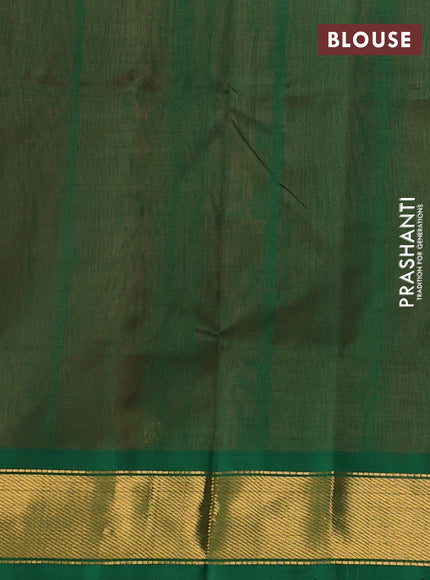Silk cotton saree orange and green with plain body and zari woven border