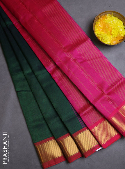 Silk cotton saree green and pink with plain body and zari woven border
