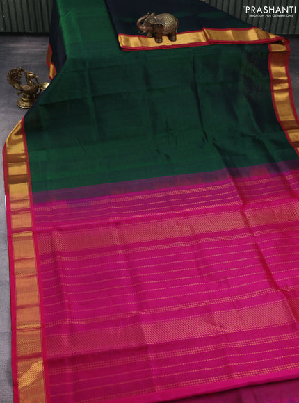 Silk cotton saree green and pink with plain body and zari woven border